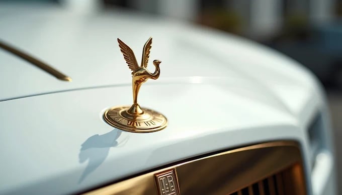 Golden Rolls-Royce hood ornament of flying spirit with elegant wings
